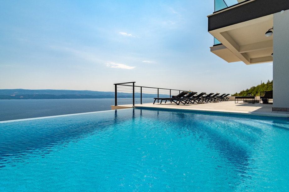 Seaview Villa Marila with 22,5 sqm private heated pool with hydromassage, 3 en-suite bedrooms (6+2 people), 1km from beach