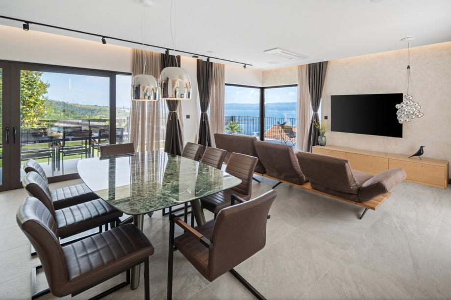 While the cozy sofa area with a flat-screen TV offers the perfect spot to relax.