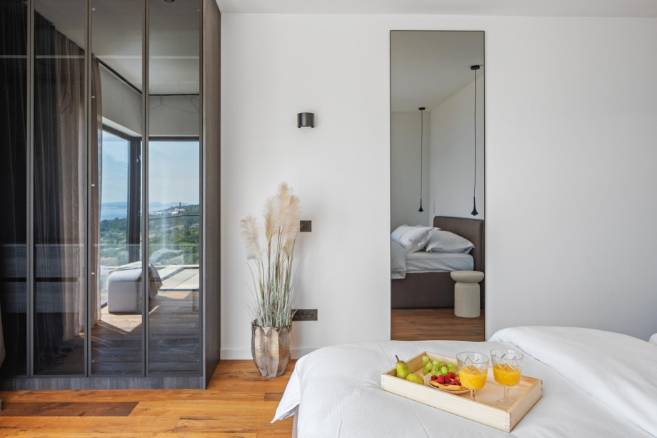 A carefully designed room with air conditioning and a private terrace with a beautiful view of the sea.