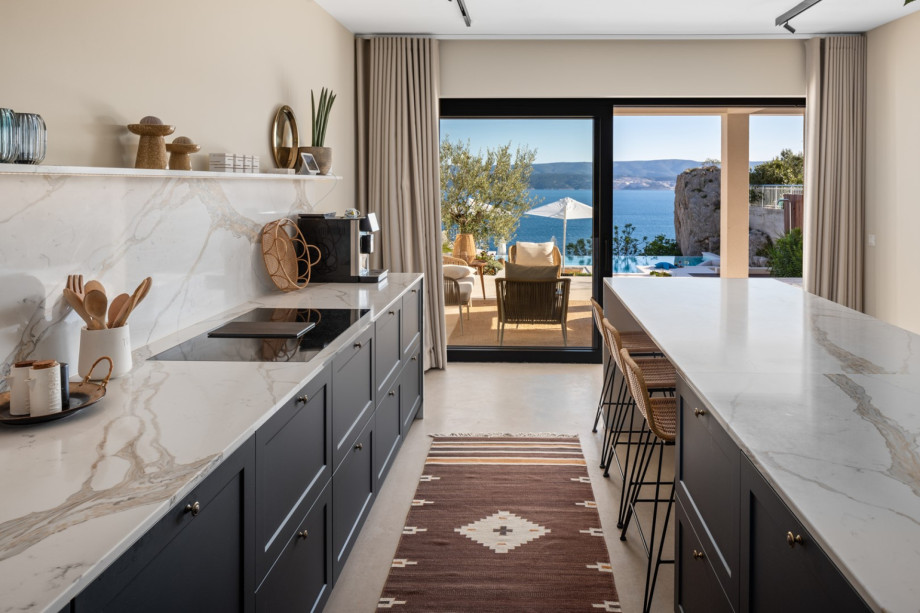 A fully equipped kitchen with a beautiful view of the Adriatic Sea
