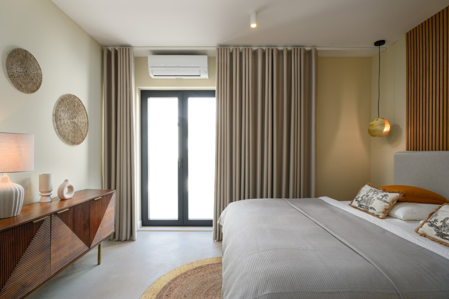 Bedroom NO4 on the west side has a king-size bed that measures 180 cm by 200 cm