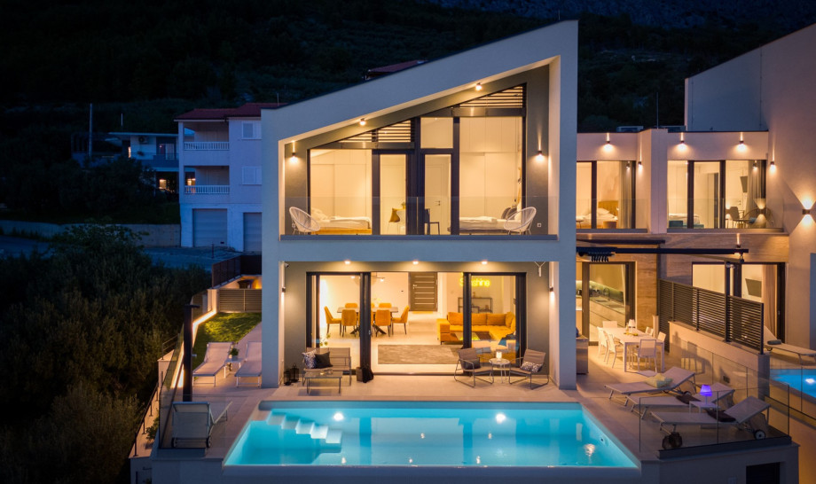 Three-bedroom villa, perched above the picturesque coastline