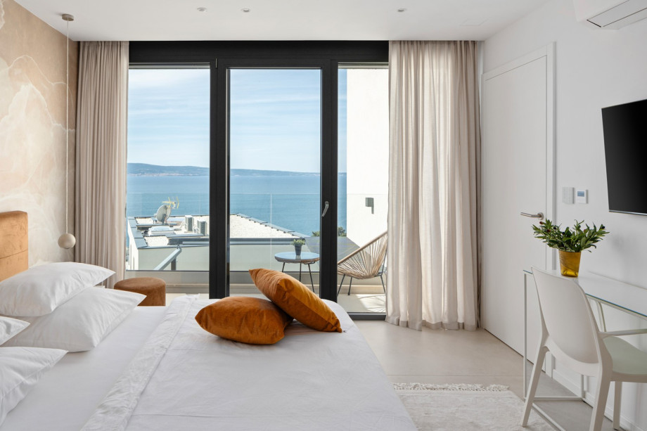 Bedroom NO1 with king-size bed, A/C, TV, balcony with views of the pool and sea