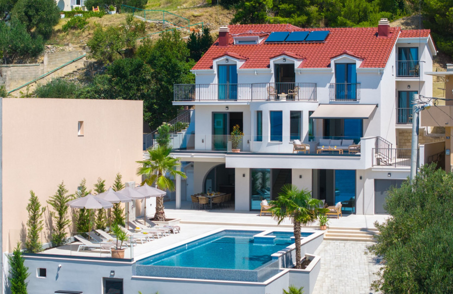 Seaview Villa Bota: Indulge in a Private Spa, Exciting Fun Zone, Expansive 56 sqm Pool, and 6 Lavish En-Suite Bedrooms!