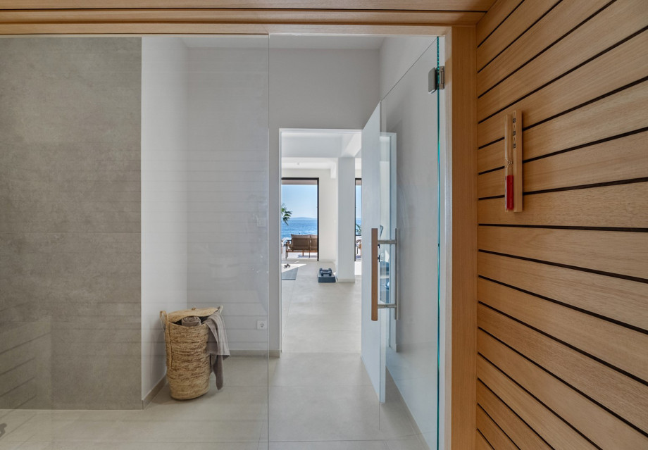 A luxurious Finnish sauna area 12sqm with a walk-in shower for ultimate relaxation