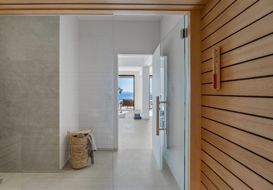 A luxurious Finnish sauna area 12sqm with a walk-in shower for ultimate relaxation