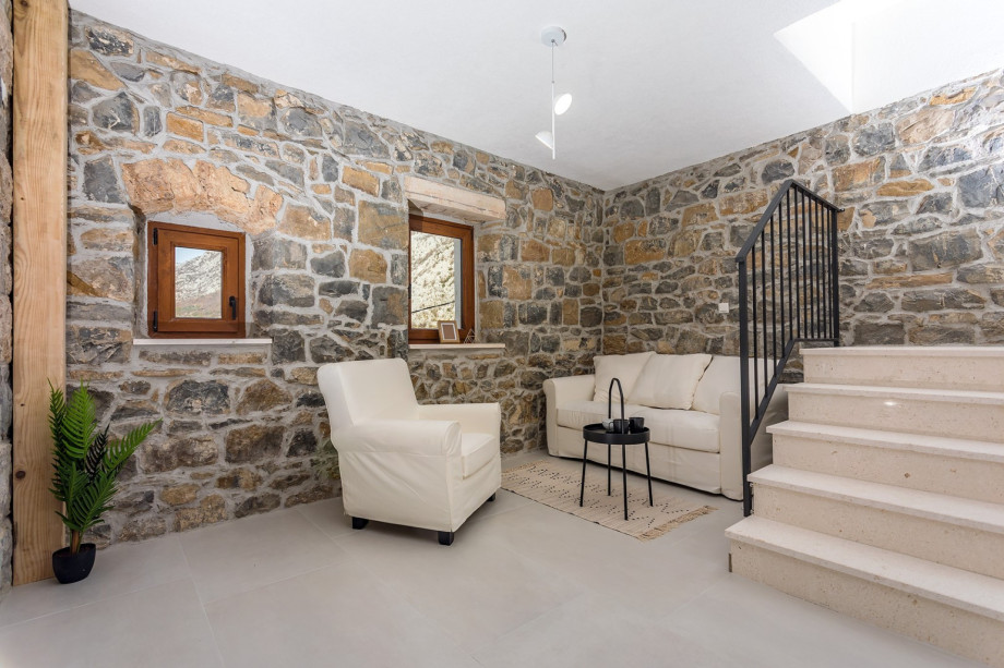 Relaxing zone with white sofas