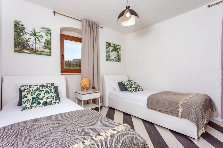 Schlafzimmer Nr. 2 mit 2x Einzelbetten 90x200cm.
