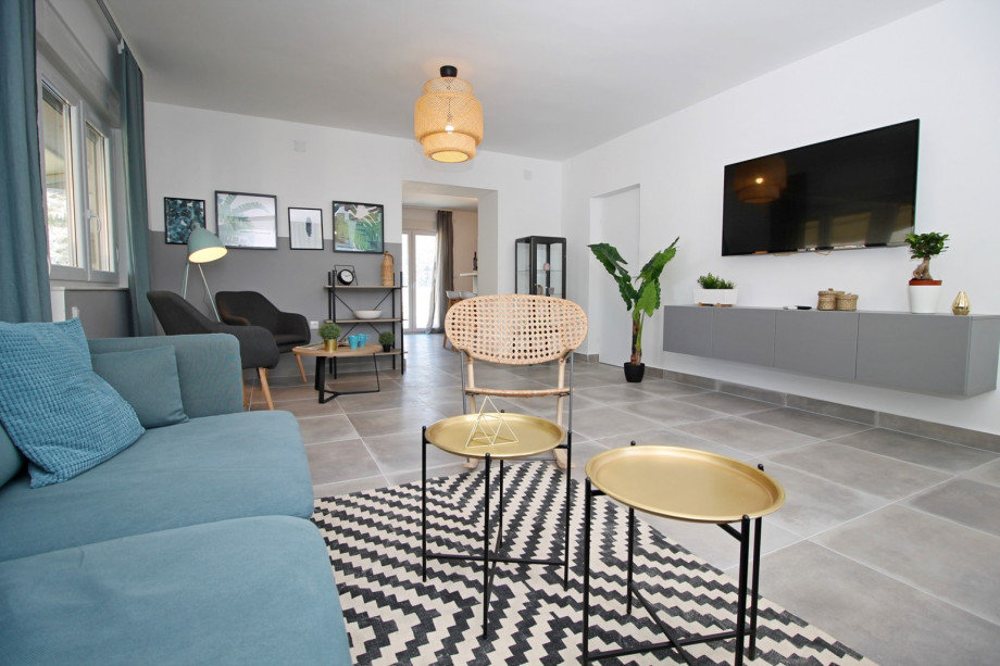 Spacious living and dining area with TV, WiFi, Air-con, exit to west terrace