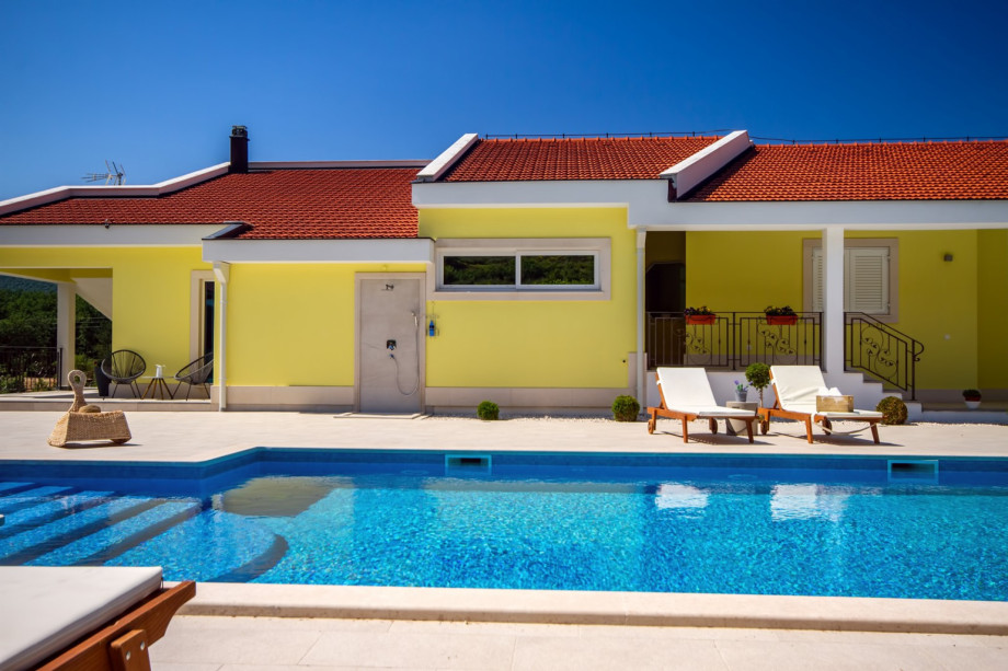 From pool area you can enter directly to kitchen area