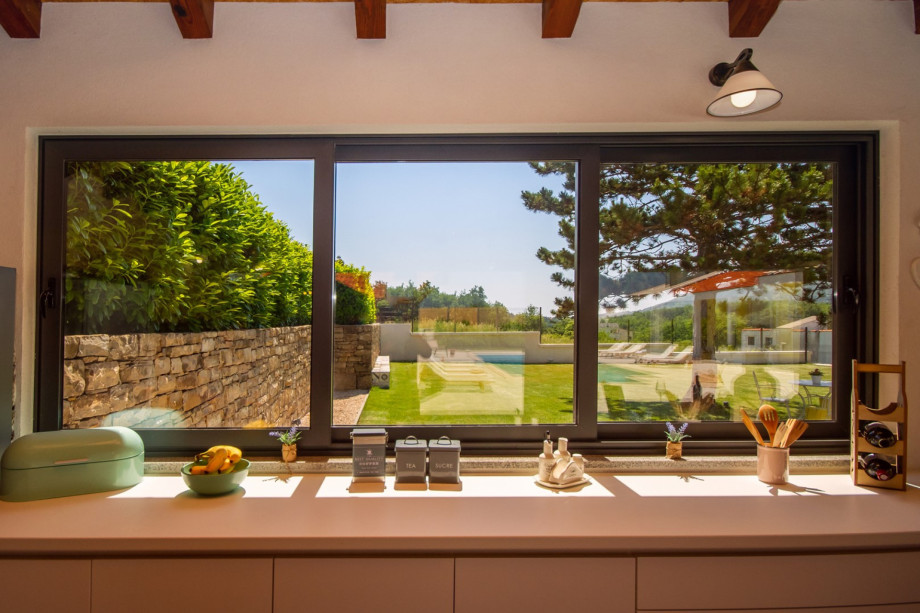 Fully equipped and spacious summer kitchen with TV and barbecue