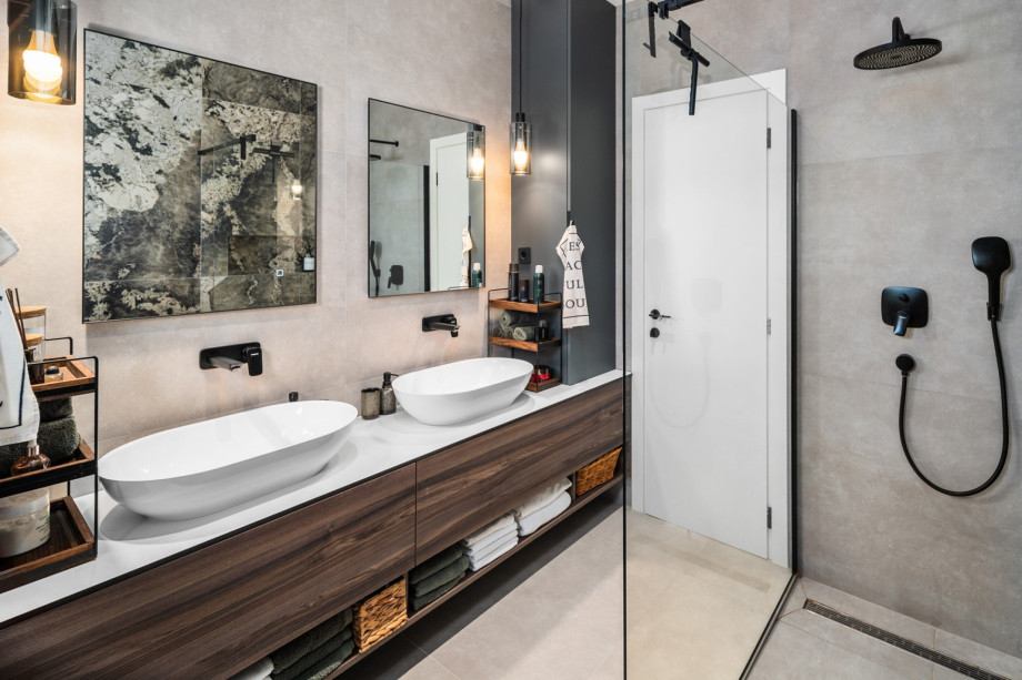 Master en-suite bathroom with double sinks and a walk-in shower.