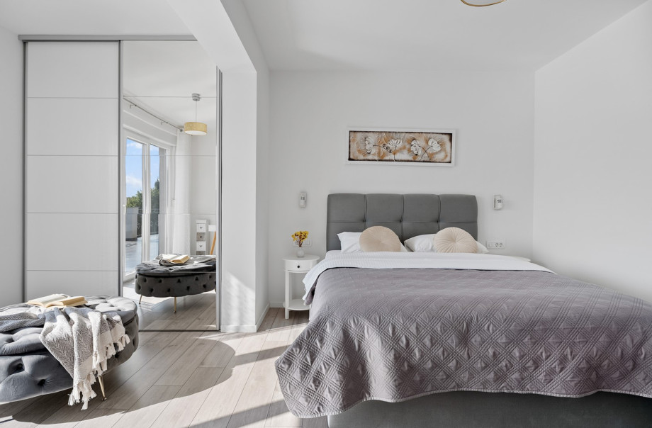 Master Bedroom 3 provides a Luxurious queen bed and air conditioning for a restful stay.