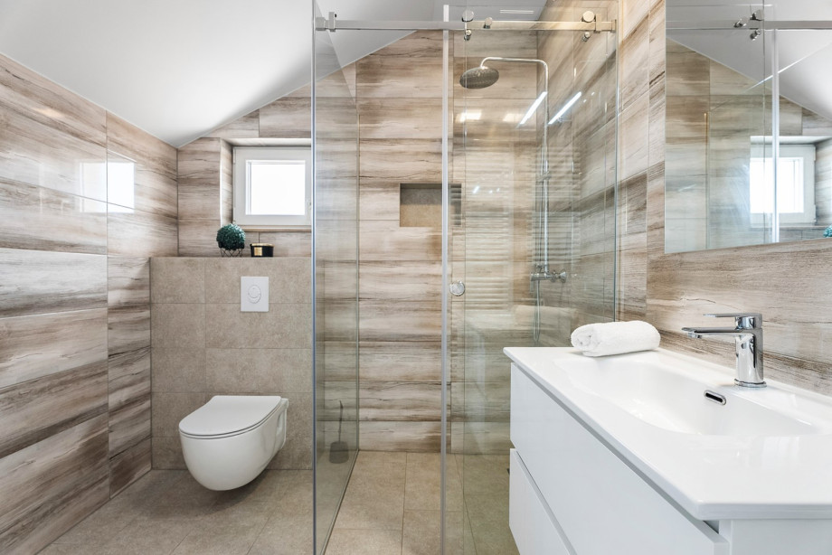 One of the bathrooms is an en-suite bathroom with a shower, providing privacy and convenience.