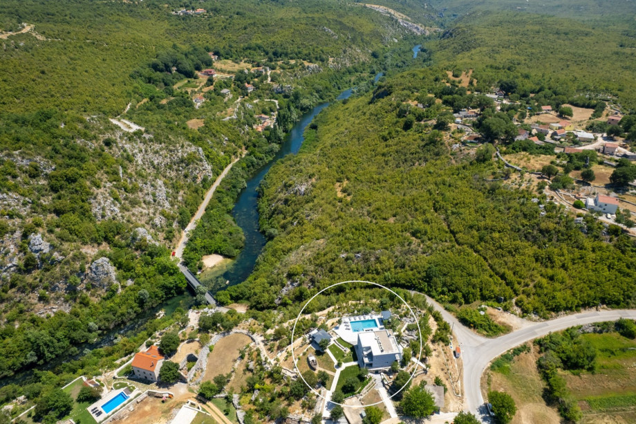 Aerial view showing the property and its proximity to the river.