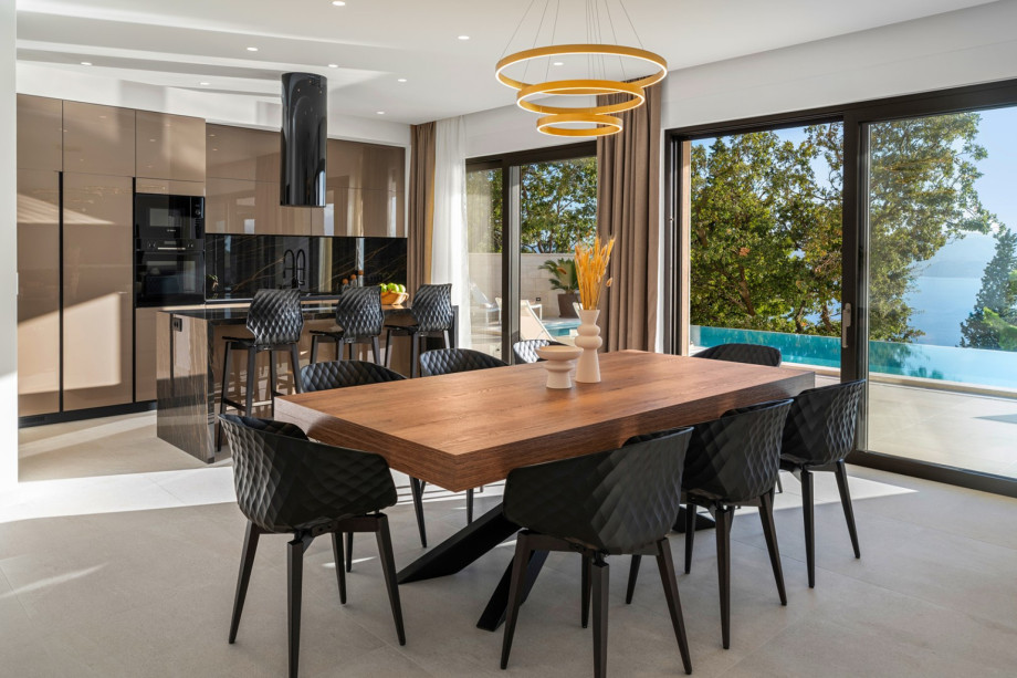 The Ground floor (pool level) offers a fully equipped kitchen with premium appliances