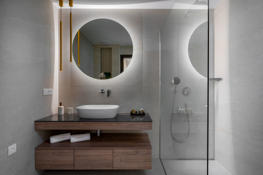 en-suite bathroom with a shower.