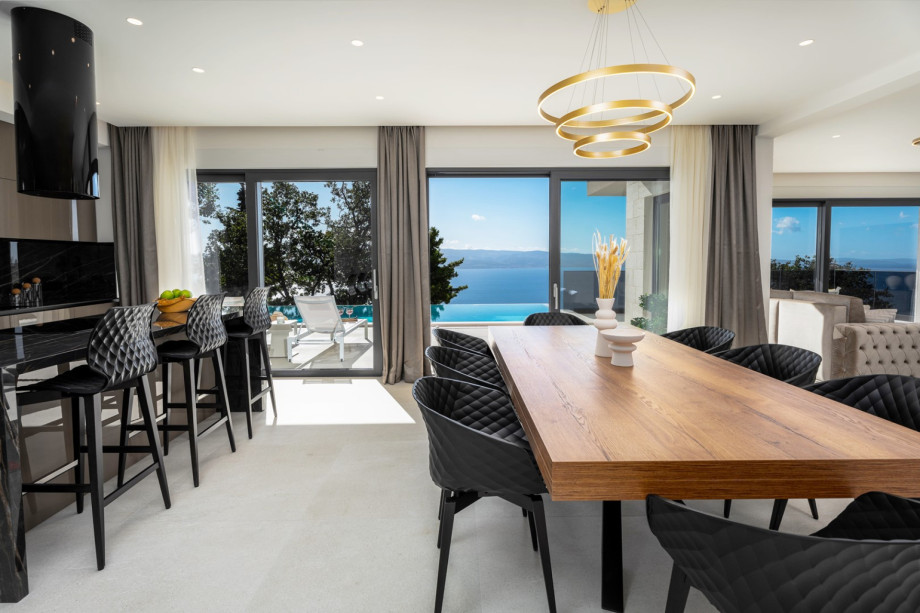 The Ground floor (pool level) offers a fully equipped kitchen with premium appliances