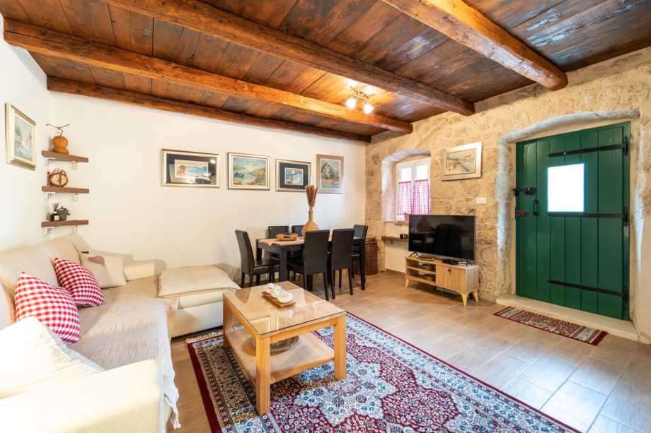 Charming rustic living room with traditional stone details.