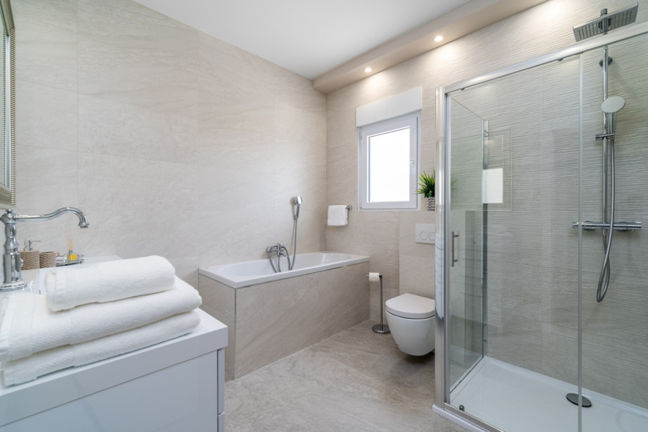 There is a Bathroom (8sqm) next to this bedroom with a bath-tub