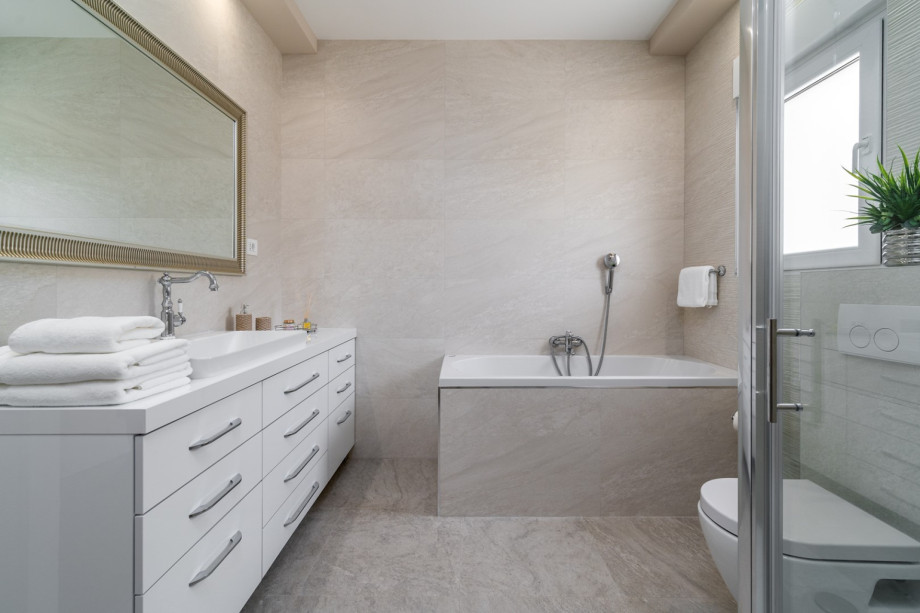 There is a Bathroom (8sqm) next to this bedroom with a bath-tub