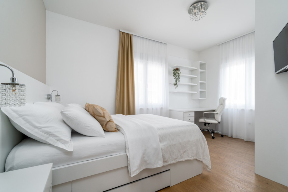 A Bedroom No4 (13.5sqm) with double bed 140cm x 200cm, A/C, TV, views of nature.