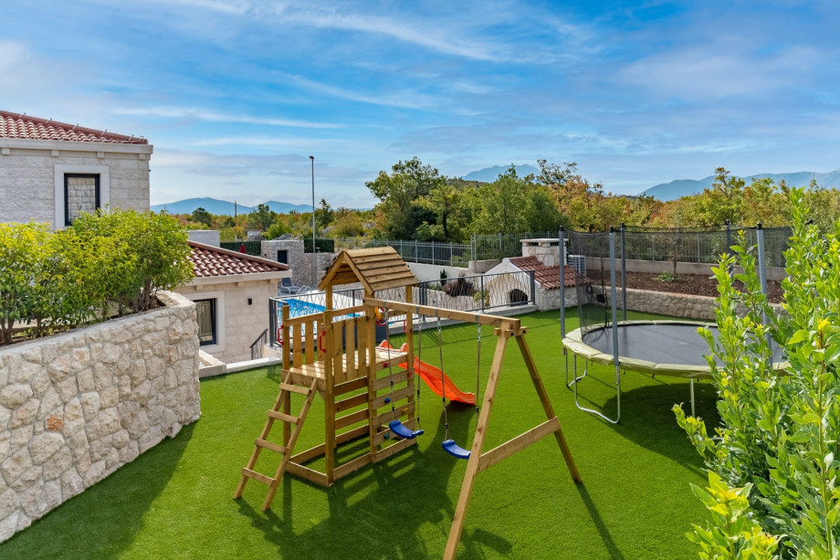 Playground is perfect fun. 
Spend your vacation with kids in Villa Neven
