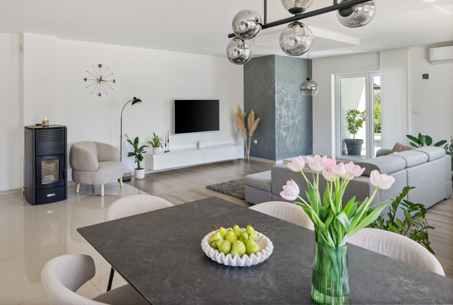 The dining area seamlessly integrates with the open-plan living space.