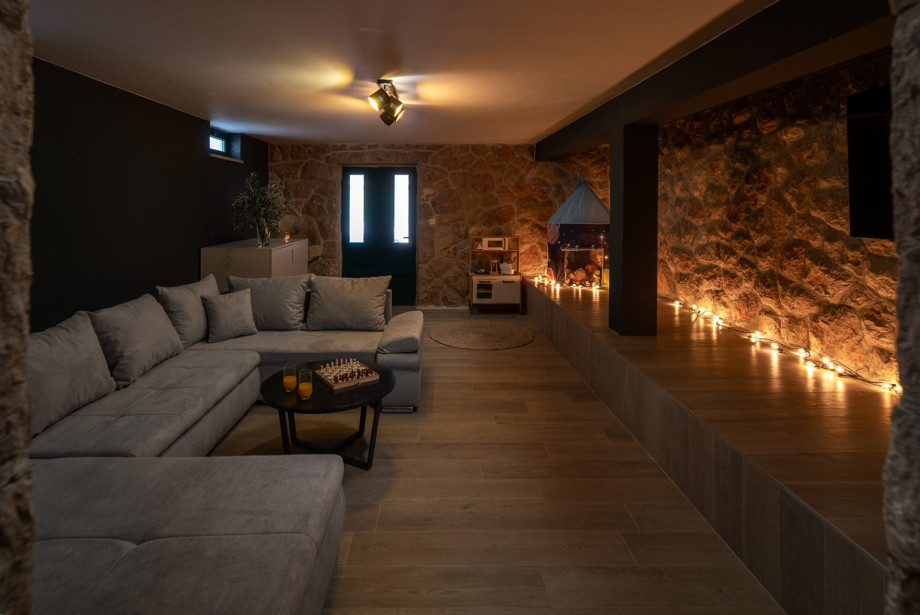 The lower ground floor offers a media room for family entertainment and fun.