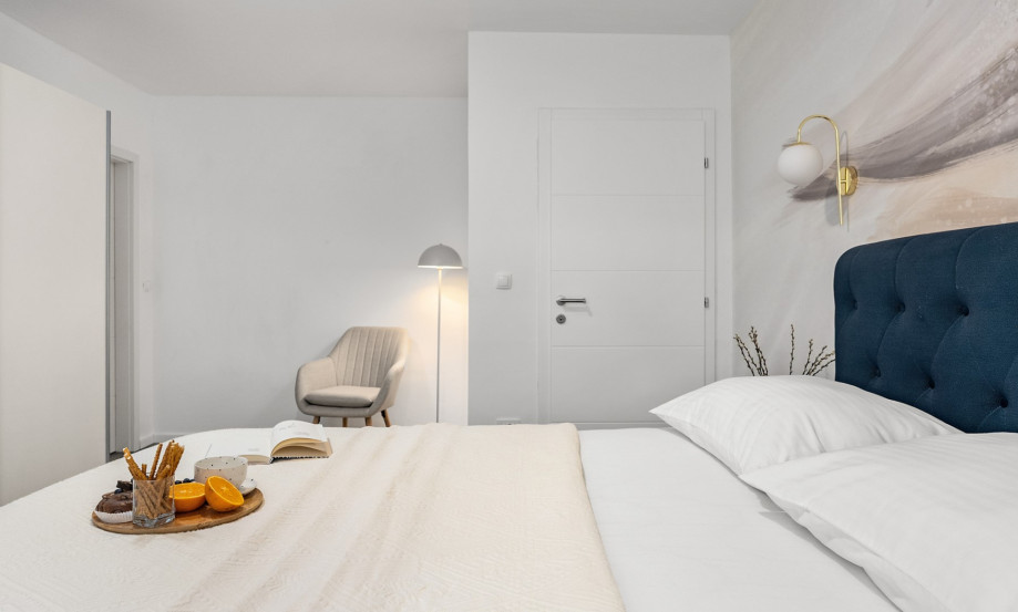 This bedroom is air-conditioned for a restful night.