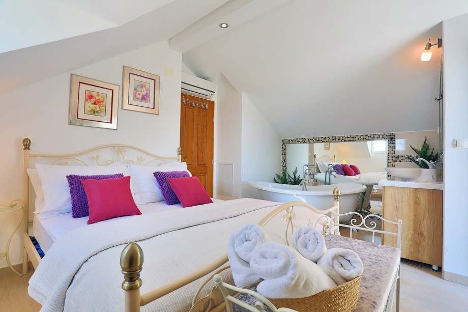 Bedroom No.3 with double bed, self-standing tub, toilet en-suite, terrace(east)