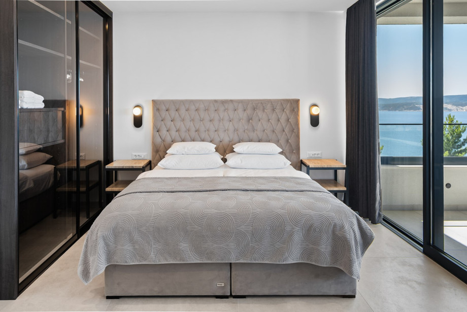 All bedrooms are spacious, sunlit, and equipped with quality linens and towels