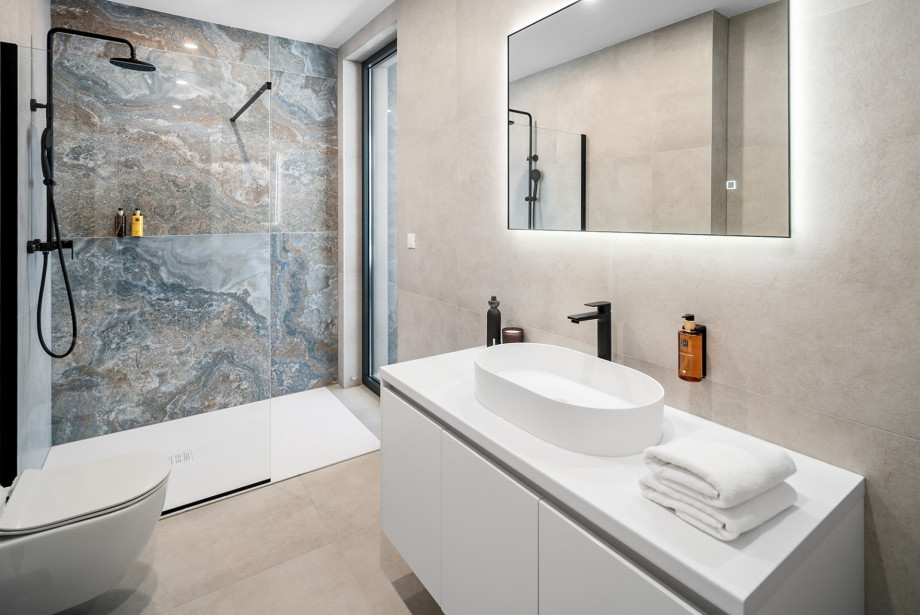 An en-suite bathroom with walk-in shower