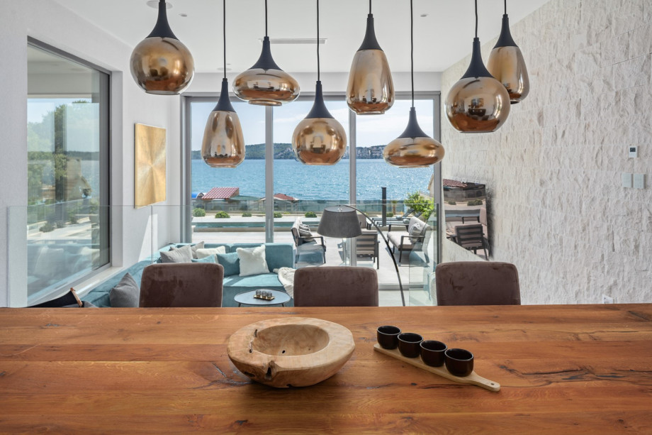Spacious indoor dining table, perfectly positioned above the living room