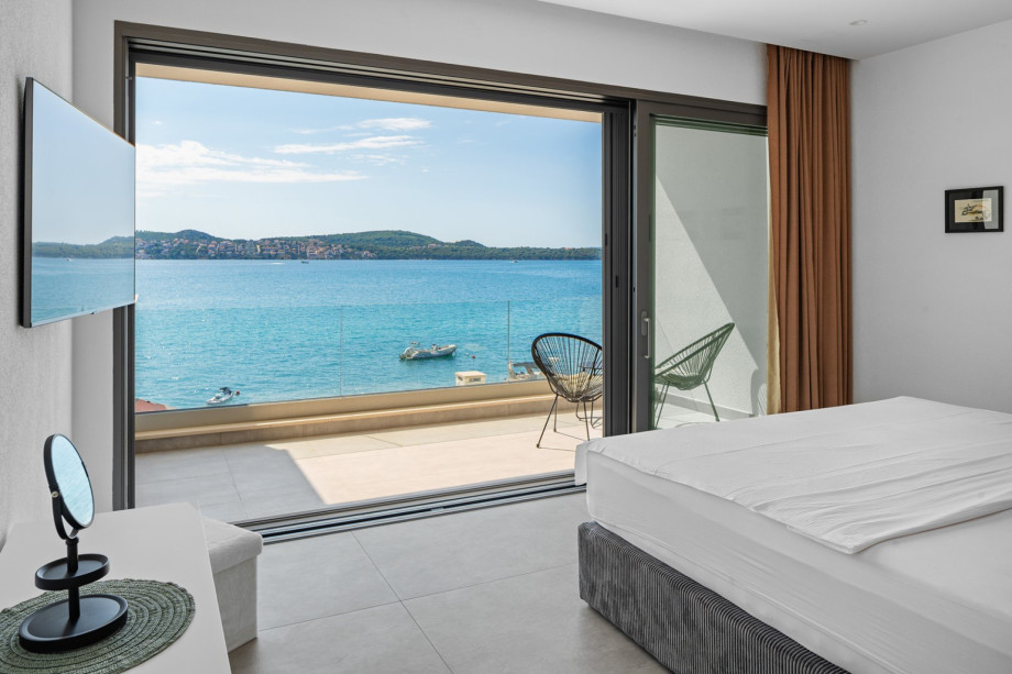 Bedroom 3, shared balcony with two other bedrooms.