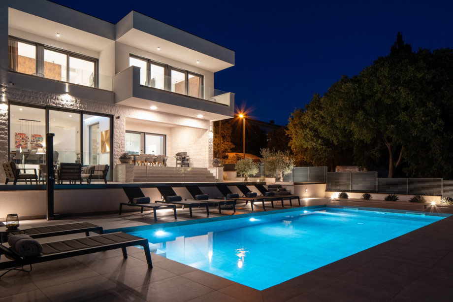 Enjoy the Finnish sauna, fitness equipment, and a dedicated wine cellar.