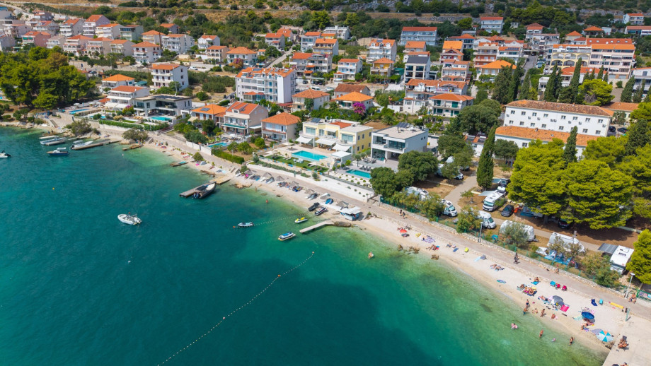 Luxury Villa Luminara is nestled in the Mediterranean landscape, where the turquoise sea meets your private sanctuary.