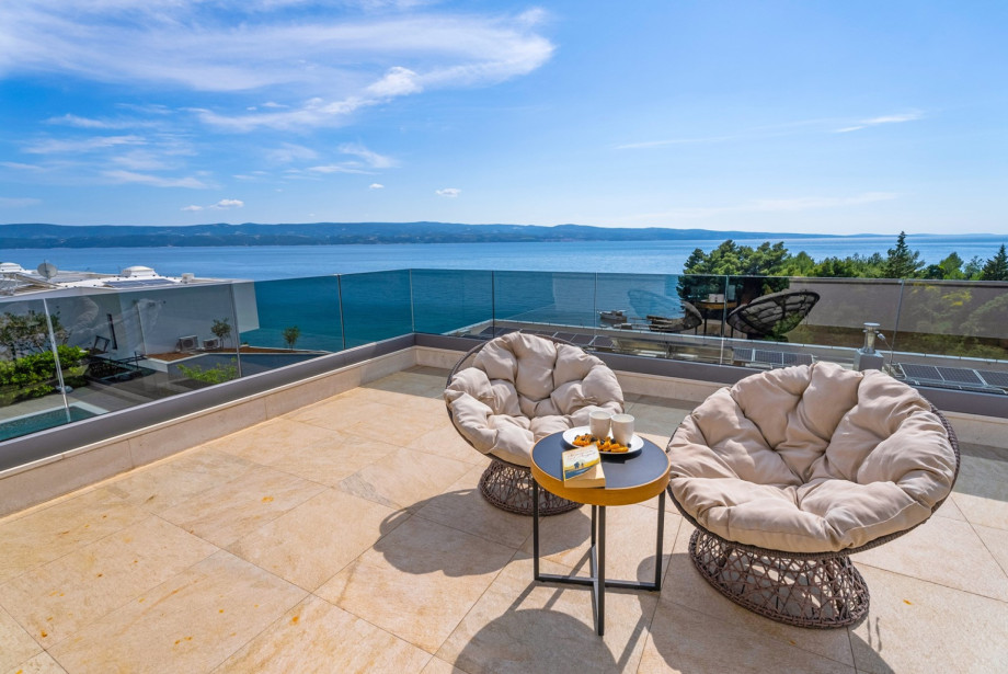 Spacious terrace in front of 2 bedrooms with amazing sea views