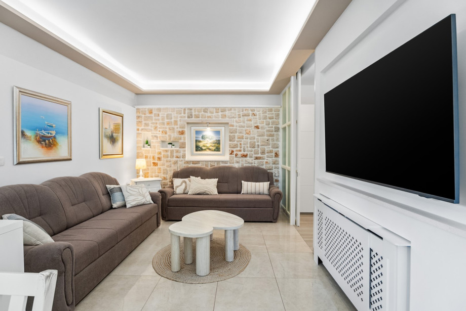 This space includes two sofas that convert into additional beds.