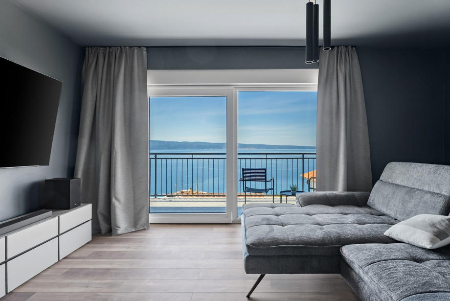 A cozy hangout space located on the first floor with sea views