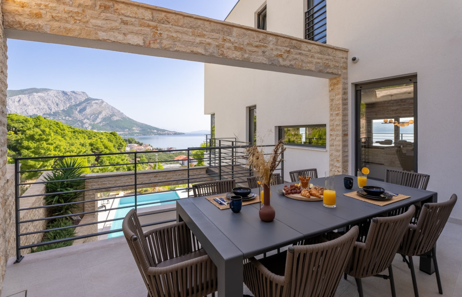 Traditional barbecue corner for your grill skills together with the outdoor dining table.