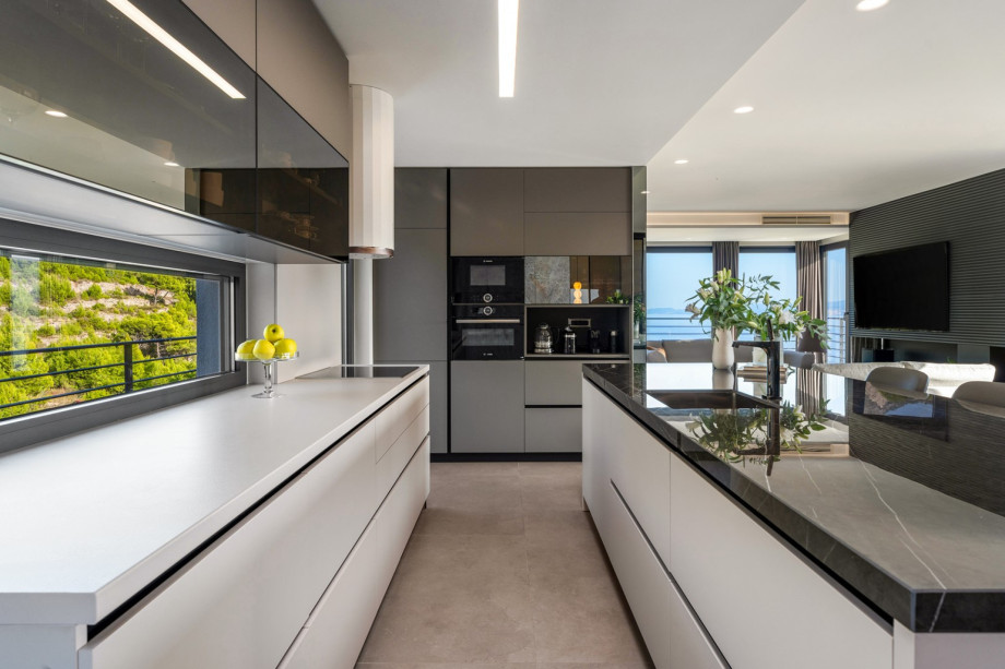 The kitchen island has all the amenities a modern guest needs