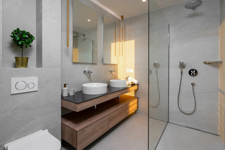 En-suite bathroom with a shower.