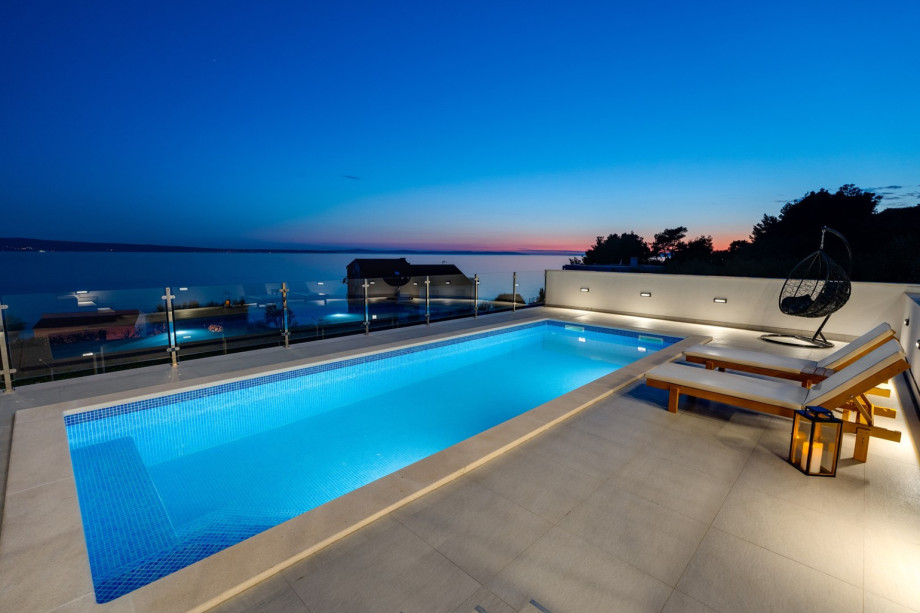 A parking lot is secure for 4 cars above the villa, on the private plot (with a video surveillance system).