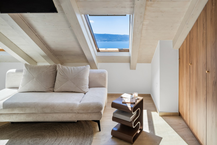 The 18 sqm attic suite provides a cozy yet stylish escape.