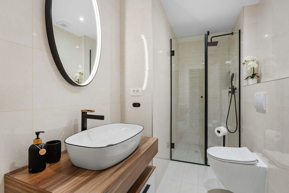 Bedroom No. 2 includes a private bathroom with a shower.