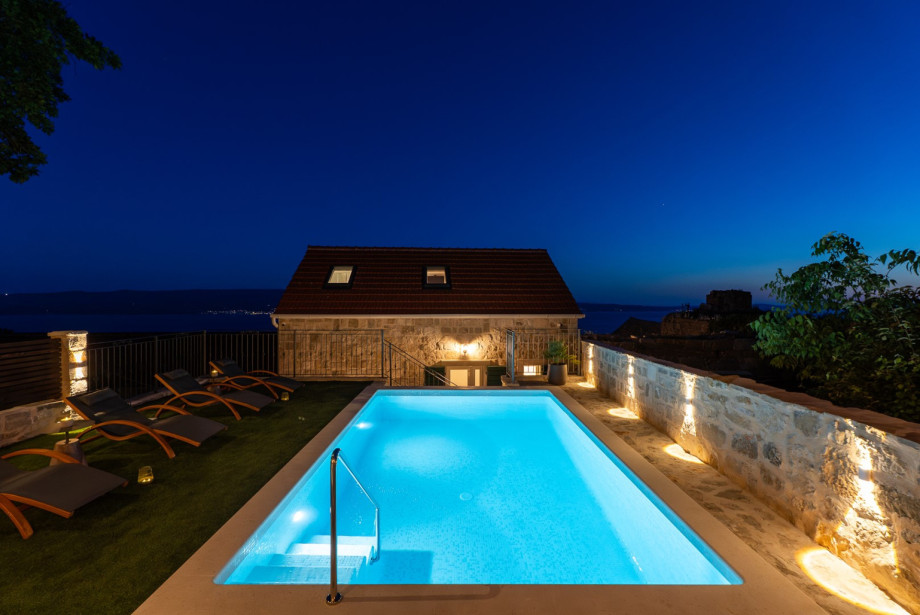 The private pool area offers a peaceful escape at the top of Krug Street.