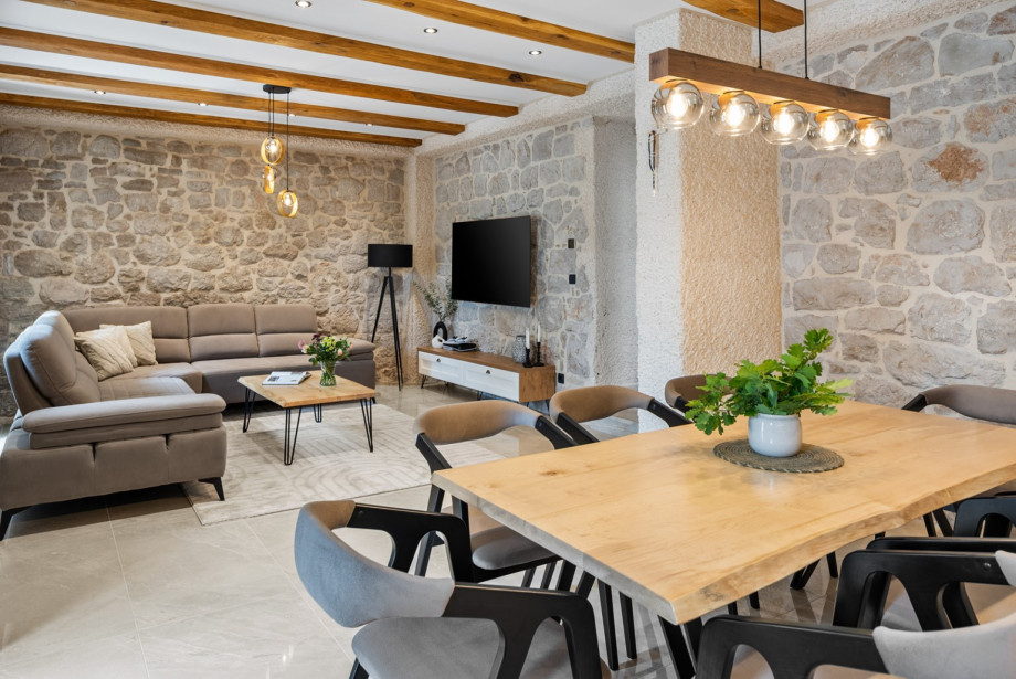 Fully air-conditioned living room with a dining area for 8 people.