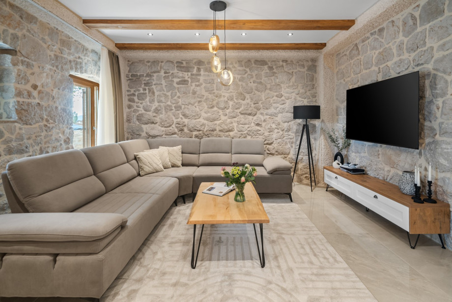 Relax on the comfortable sofa in a beautifully appointed space.