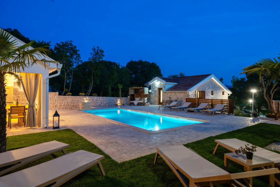 The sun deck features 8 comfortable deck chairs  next to the heated pool.